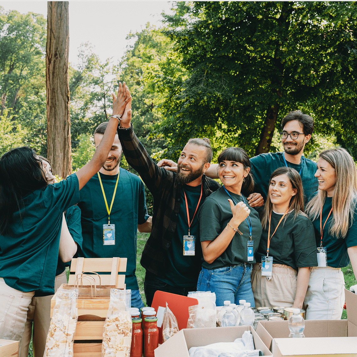 Group celebrating at an outdoor gathering.